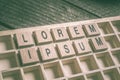 Closeup Of The Words Lorem Ipsum Formed By Wooden Blocks In A Typecase