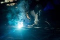 Closeup worker doing the welding in a workshop Royalty Free Stock Photo