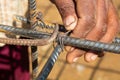Worker Tying Intersecting Rebar Rods Royalty Free Stock Photo