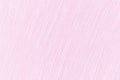 Closeup of a woven pink fabric background