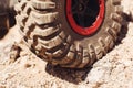 Closeup of 4x4 truck tire on rock track