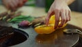 Unknown guy cooking food on bbq grill outside. Yellow bell pepper on grid Royalty Free Stock Photo