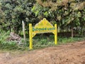 Closeup of Yellow Colored Concrete Name Board or Precast RCC Sign Board with regional language written as Vinayaka Badavane
