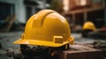 A closeup of yellow construction helmet, A beautiful construction yard in the background. Generative AI Royalty Free Stock Photo