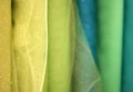 Closeup of Yellow Green and Blue Tulle Fabrics Royalty Free Stock Photo