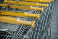 yellow supermarket trolleys alignment