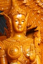 Closeup yellowish Candle statue of lady angel, one of the sculpture on parade of Thailand`s annual buddhism traditional festival