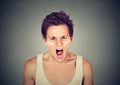 Closeup young angry man screaming Royalty Free Stock Photo