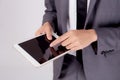 Closeup young asian business man showing and presenting tablet computer with blank screen with success isolated. Royalty Free Stock Photo