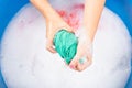 Female squeeze wring out wet fabric cloth Royalty Free Stock Photo