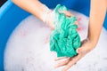 Female squeeze wring out wet fabric cloth Royalty Free Stock Photo