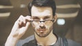 A closeup of a young bearded man looking at the camera Royalty Free Stock Photo