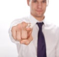 Closeup of a young business man pointing at you Royalty Free Stock Photo