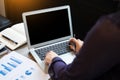 Closeup of Young business man working at office with laptop and Royalty Free Stock Photo