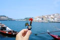 Man with a Rooster of Barcelos, emblem of Portugal