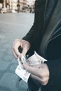 Man counting some czech koruna banknotes