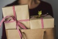 woman with a paper shopping bag full of gifts Royalty Free Stock Photo