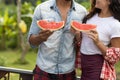 Closeup Of Young Couple Holding Watermelon Slice Embracing Together Unrecognizable Man And Woman Outdoors ON Summer Royalty Free Stock Photo