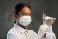 Closeup of young female doctor with syringe Royalty Free Stock Photo