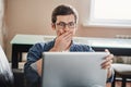 Closeup of young handsome man shoked with bad news Royalty Free Stock Photo