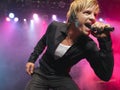 Closeup Of Young Man Singing Into Microphone Royalty Free Stock Photo