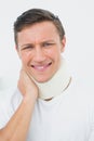 Closeup of a young man wearing cervical collar Royalty Free Stock Photo