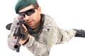 Closeup of young soldier or sniper aiming with a rifle Royalty Free Stock Photo