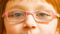 Closeup of young toddler girl in eyeglasses