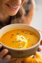 Closeup on young woman enjoying pumpkin soup Royalty Free Stock Photo