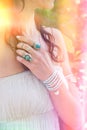 Closeup of young woman hand with lot of boho style jewrly, ring Royalty Free Stock Photo