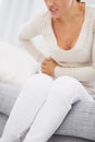 Closeup on young woman having stomach pain Royalty Free Stock Photo