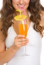 Closeup on woman in swimsuit drinking cocktail Royalty Free Stock Photo