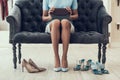 Closeup of Young Woman trying on Shoes in Store Royalty Free Stock Photo