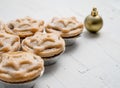 Closeup of yummy Christmas cookies and a golden ball, Christmas mood