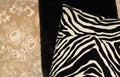 Closeup of zebra patterned pillow against black blanket Royalty Free Stock Photo