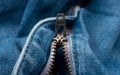 Closeup of zipper in blue jeans. Zipper lock. A piece of denim Royalty Free Stock Photo