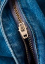 Closeup of zipper in blue jeans. Zipper lock. A piece of denim Royalty Free Stock Photo