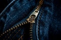 Closeup of zipper in blue jeans. Zipper with lock. A piece of denim Royalty Free Stock Photo