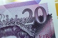 A closeup of ÃÂ£20 Twenty pounds cash money bill Sterling polymer banknote from the bank of England