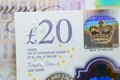 A closeup of ÃÂ£20 Twenty pounds cash money bill Sterling polymer banknote from the bank of England