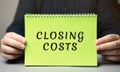 Closing costs concept. Extra amount of money that you pay when buying a house. Royalty Free Stock Photo