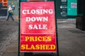 Closing Down Sale - Prices Slashed on a street sign