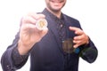 Closu up of handsome business man in suit with silver bitcoin in hand isolated on white background