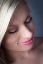 Closuep of Beautiful Blond looking down smiling Royalty Free Stock Photo