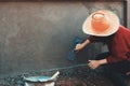 closup hand of workers plastering on wall outdoor in construction site