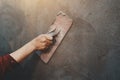 closup hand of workers plastering on wall outdoor in construction site Royalty Free Stock Photo