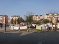 The cloth being shined in a sunny day within street block