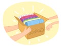 Cloth donation box vector with colorful clothes in it. Hands giving box to another hand