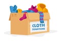 Cloth Donation and Charity Concept. Carton Box Full of Different Clothes for Poor People and Refugees in Need