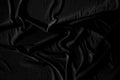 Cloth gray black shiny elegant, abstract background. Detail fabric of pattern silk texture satin velvet material, luxurious. Crump